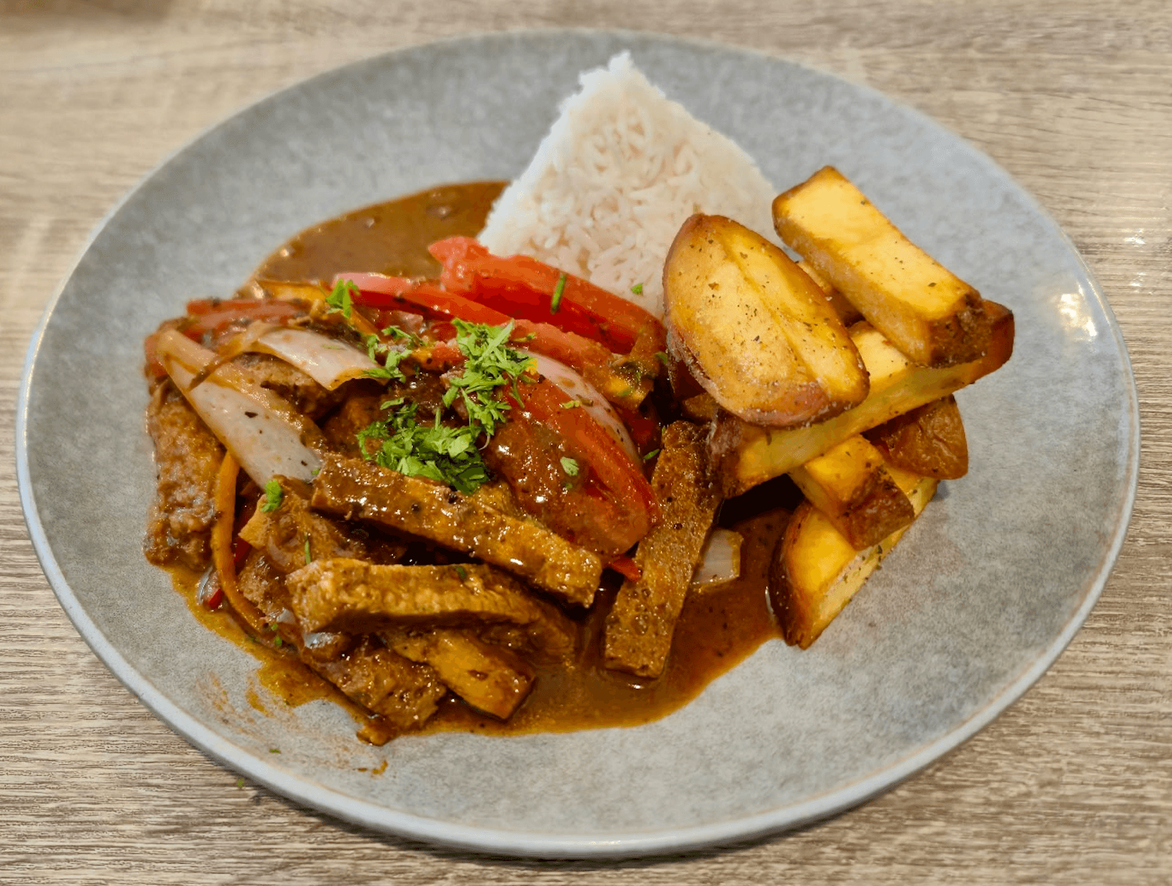 SATTVA - Lomo Saltado (Our favorite dish here!)